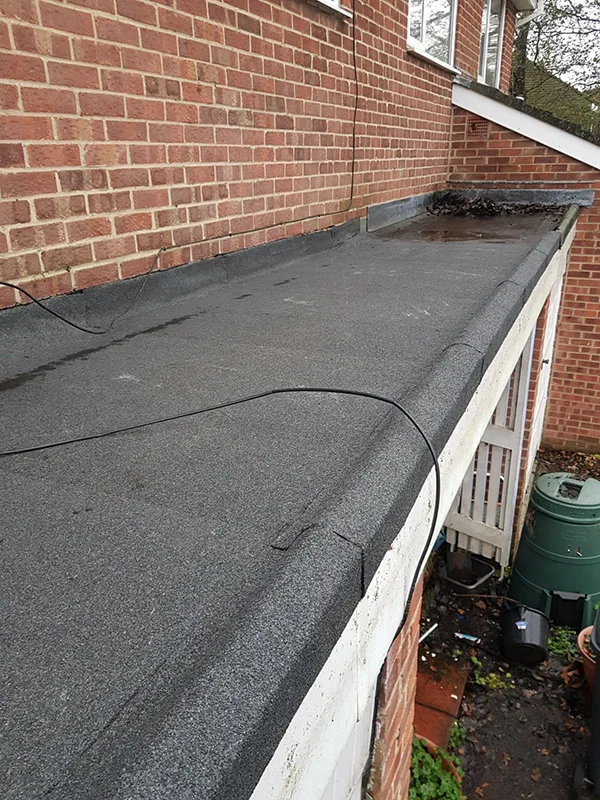 Completed flat roof felt covering on a residential extension in Dorset